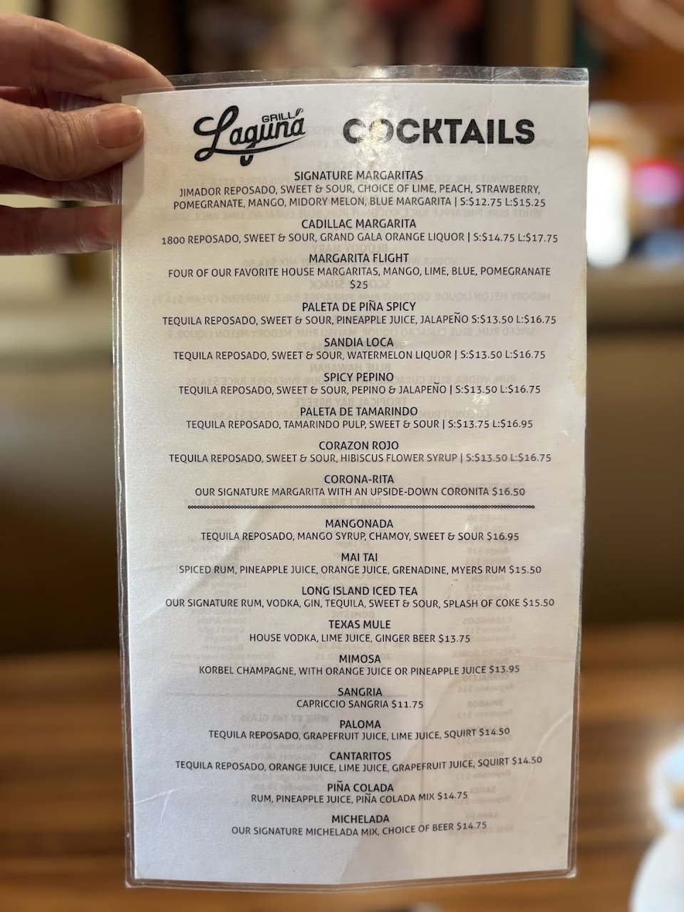 Molcajete and seafood dishes listed here.